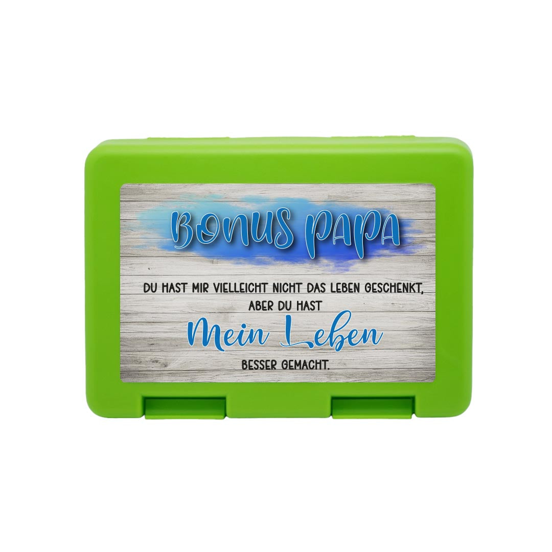 Brotdose "Bonus Papa" und Eschenholz-Hintergrund