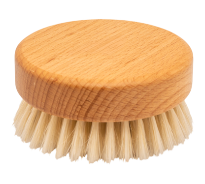 Runde Badebürste aus Holz mit Borsten.